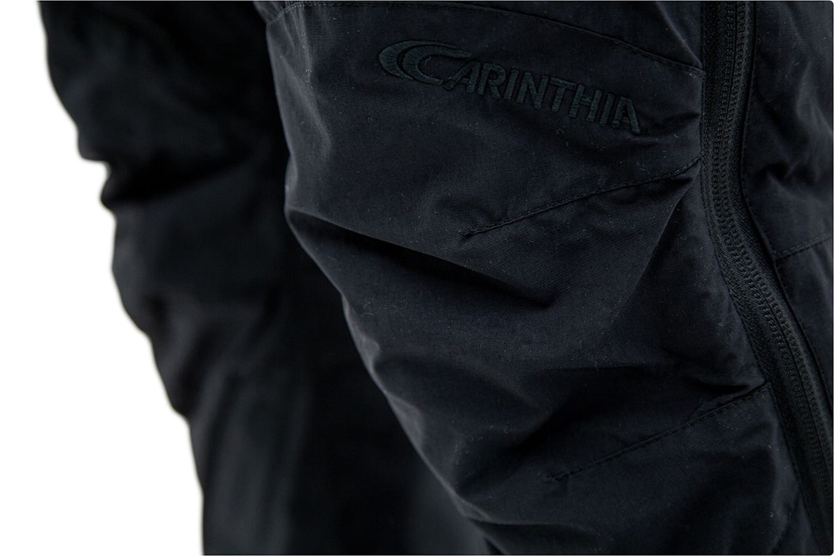 каринтія-брюки-вітровка-чорні-коліна
